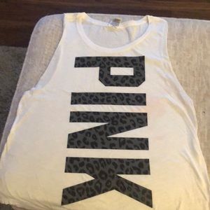 Pink muscle type T Shirt . White , small.